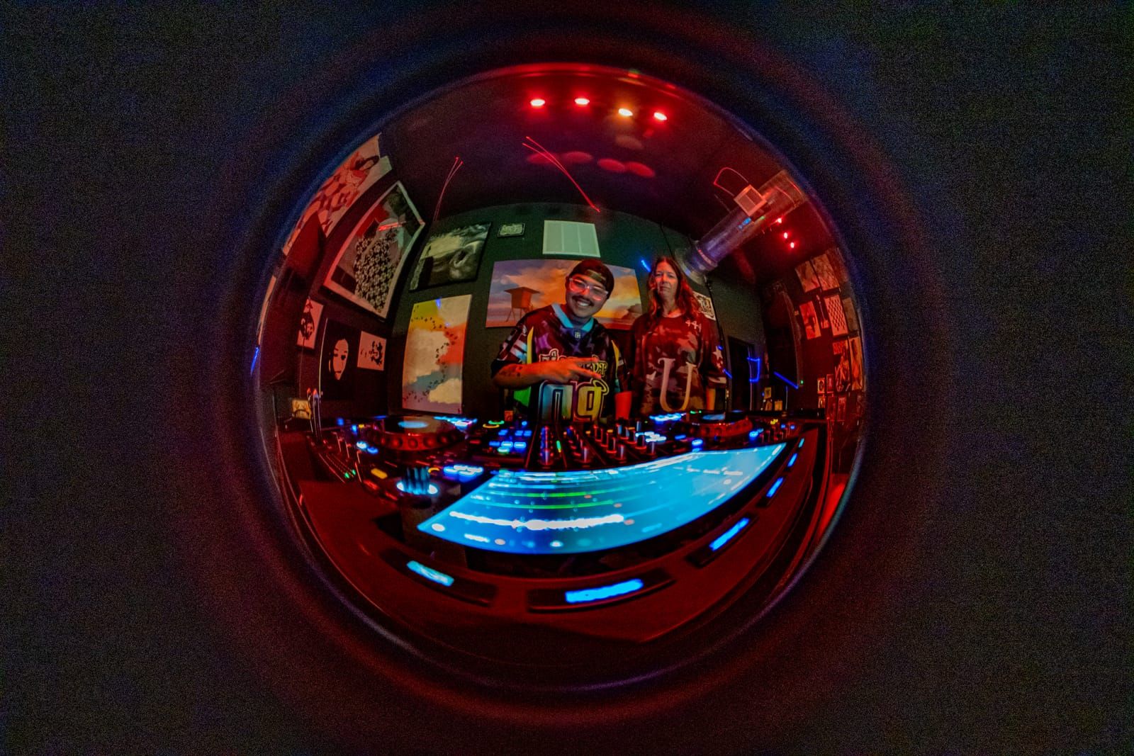 Fisheye reflection of the gallery room caught in a mirrored lens